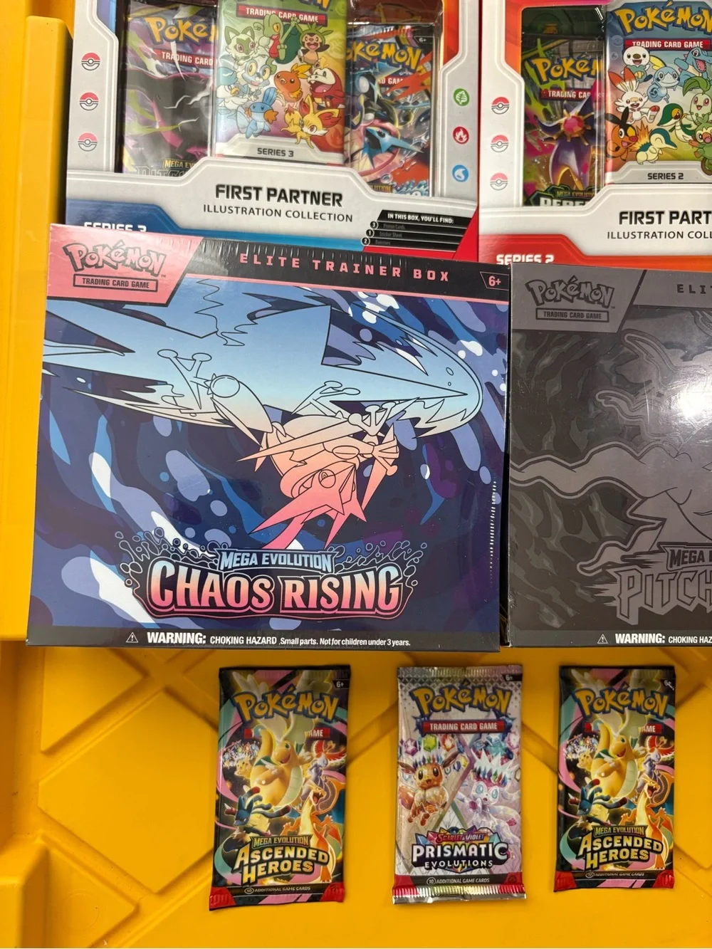 Pokemon Booster & Elite Trainer Box Assortment with Yellow Packaging